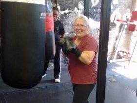 F.R.E.S.H. boxing group participant boxing at a gym