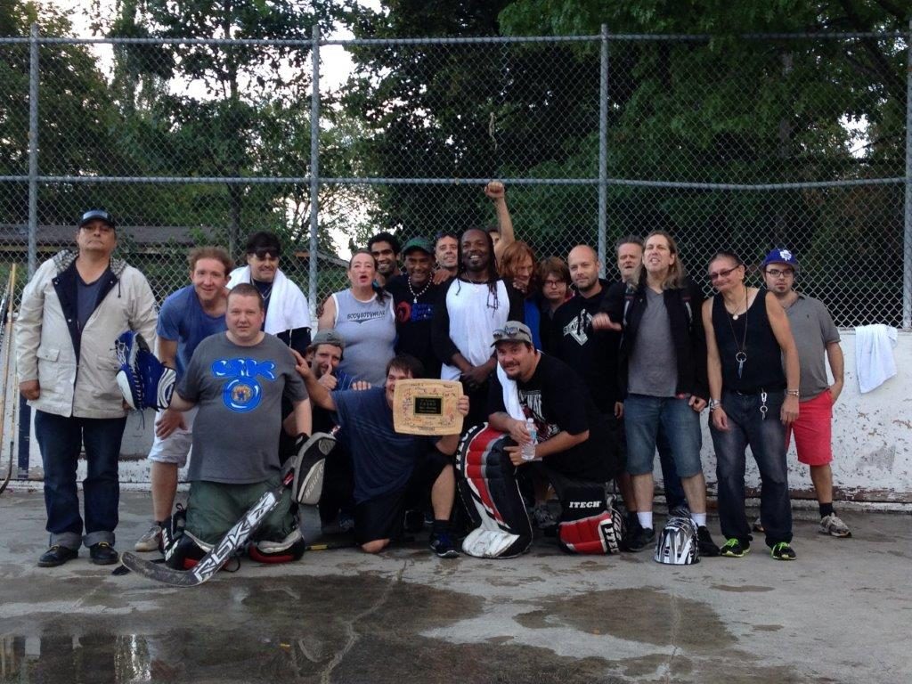 F.R.E.S.H. ball hockey group participants at a ball hockey rink